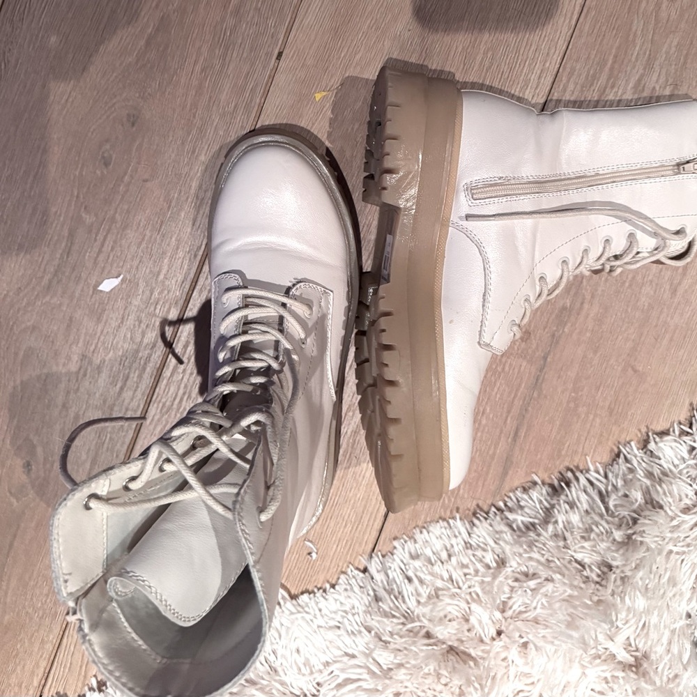 Crème combat boots.  Worn once